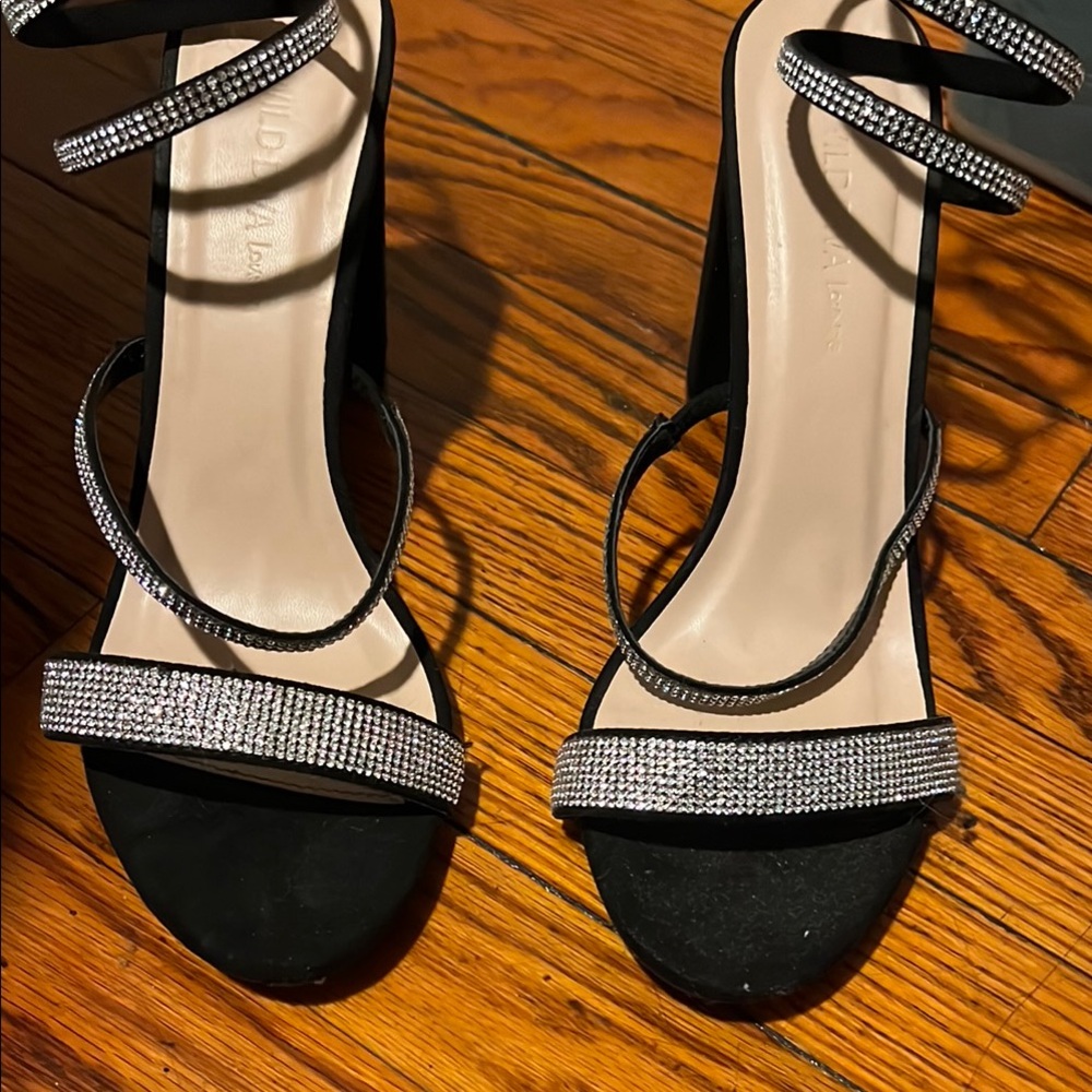 Chic Black and Silver Heels for a Sophisticated Look